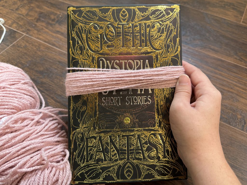 finishing wrapping the yarn for the tassels