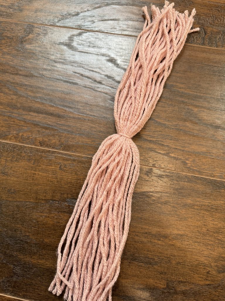 example of cut tassel before finishing the tassel